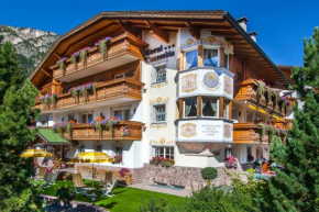 Гостиница Hotel Garni Concordia - Dolomites Home  Сельва-Ди-Валь-Гардена
